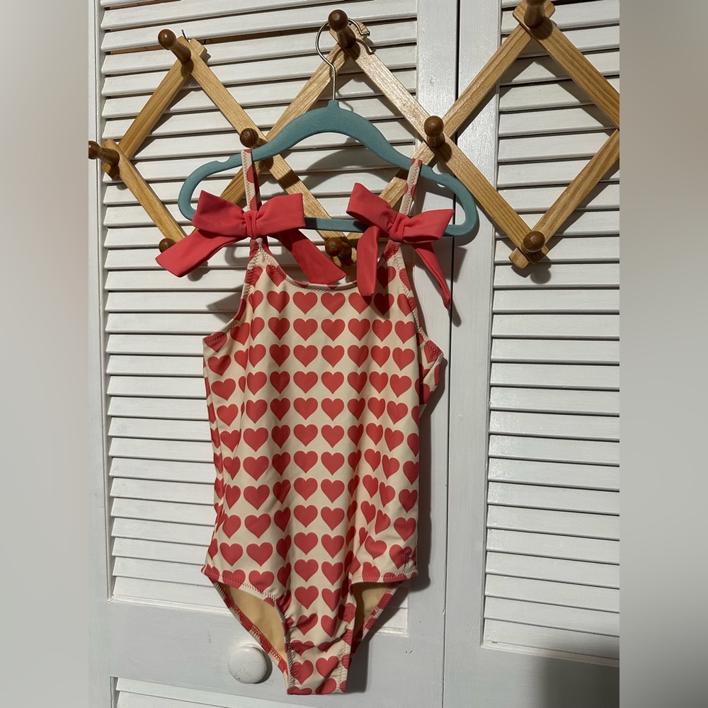 Pink chicken hearts swim 8 year